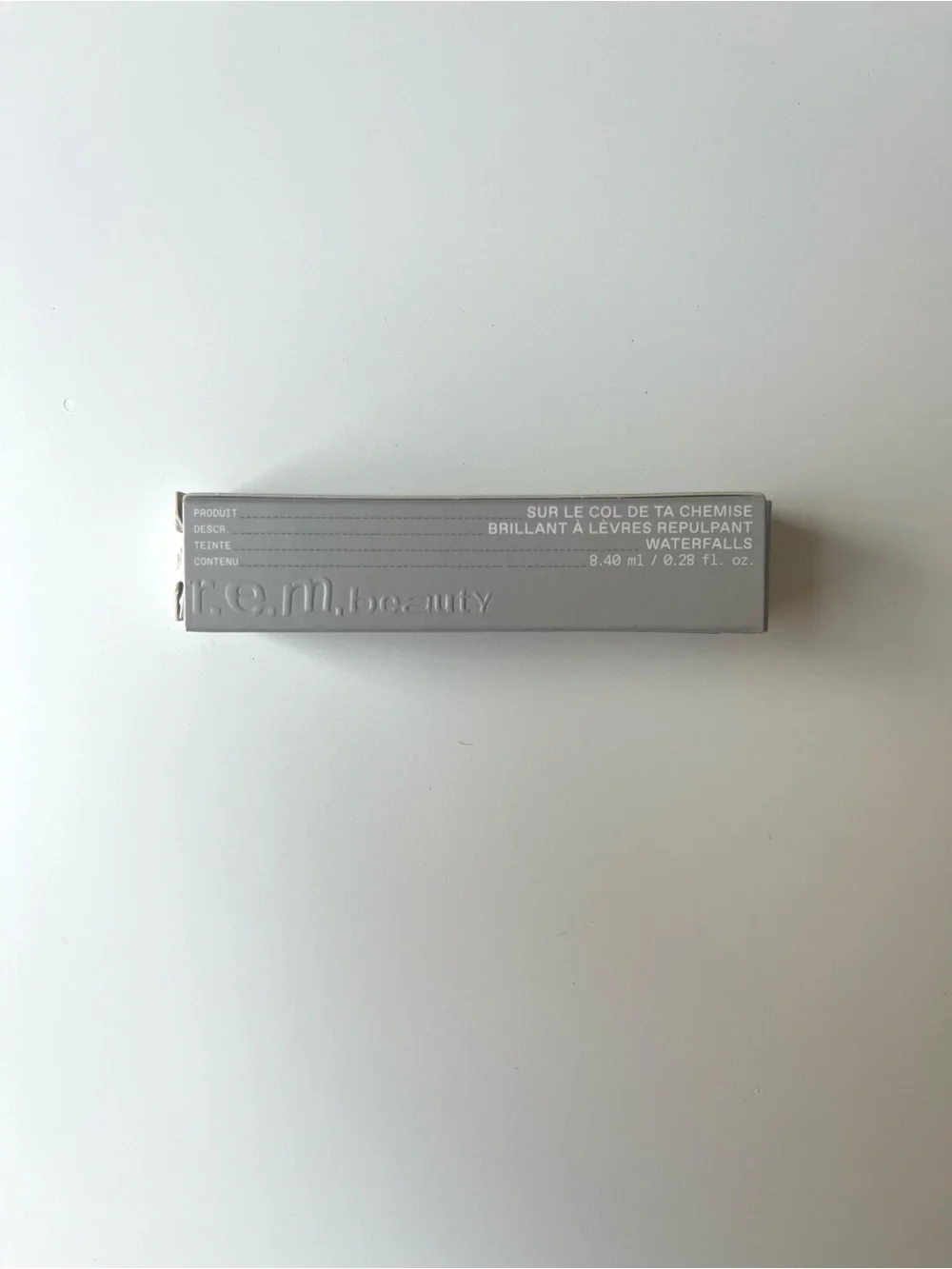 r.e.m. beauty by Ariana Grande, On Your Collar Plumping Lip Gloss, “Waterfalls”